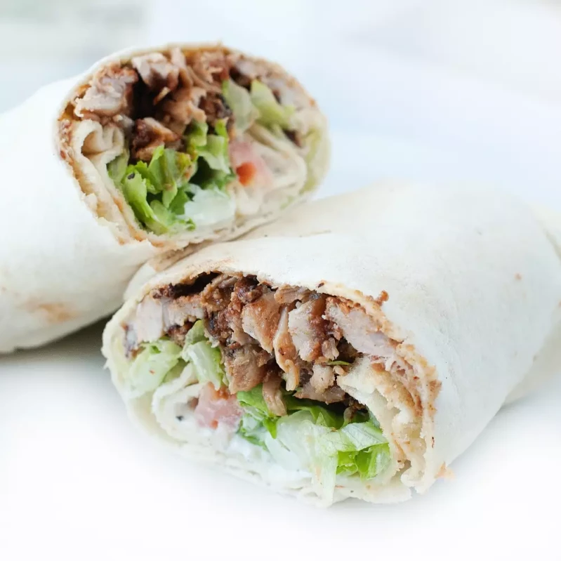 Aladin's Chicken Shawarma Wrap Winnipeg — halal chicken with garlic sauce, pickles and fresh vegetables